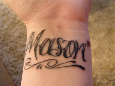 tattoos of names on hand|name tattoo designs for male.